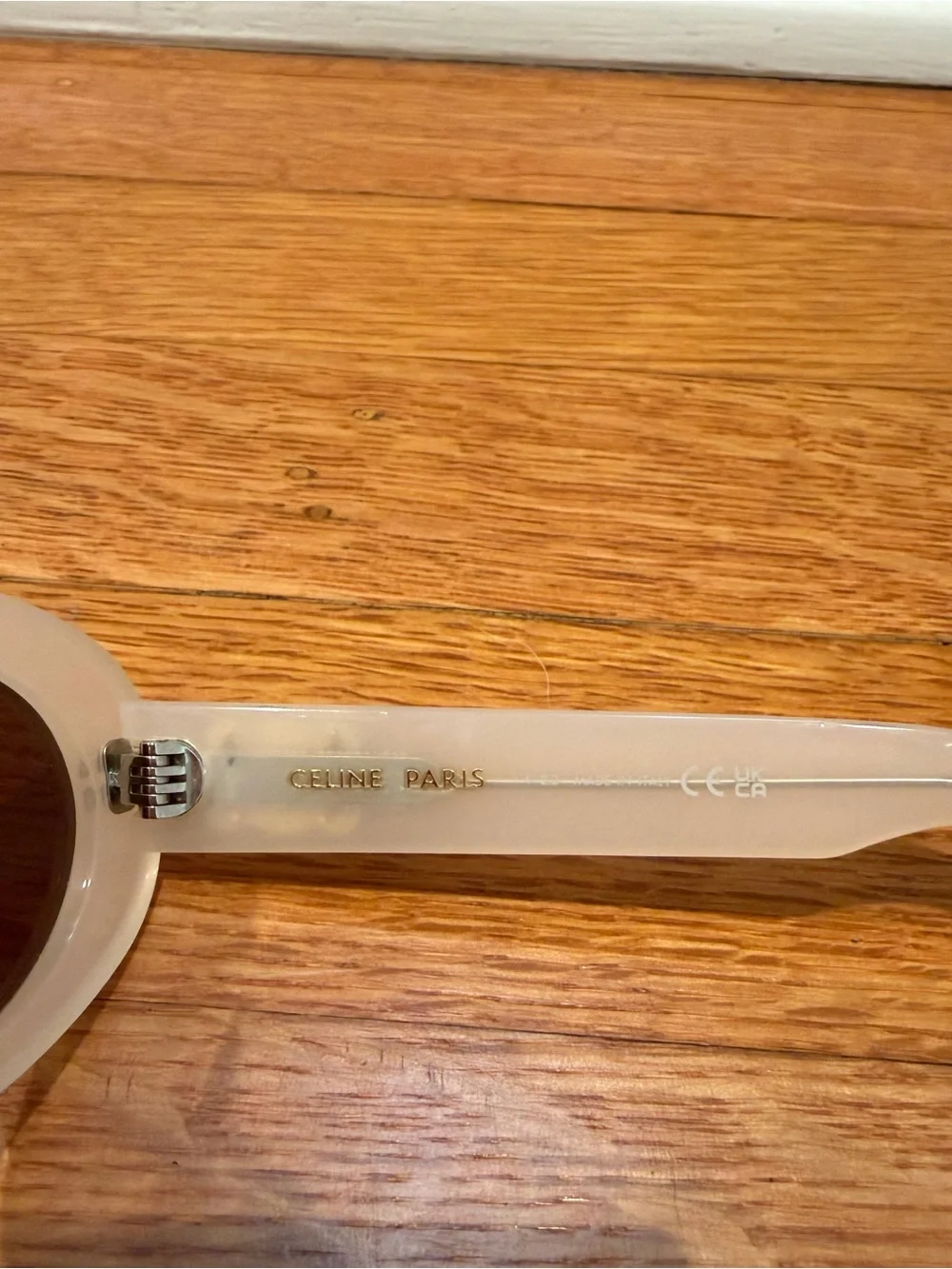 Celine Eyewear Triomphe oval acetate sunglasses, white, 52 mm, gently used